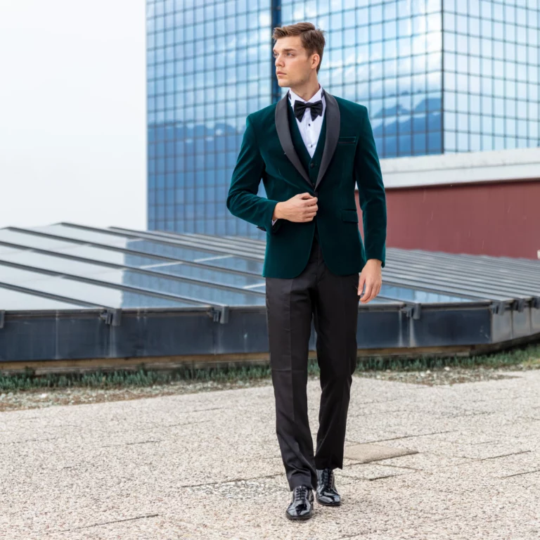 A man confidently walking in a sharply tailored custom suit, embodying elegance and style.